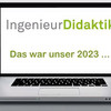 Aufgeklapptes Notebook, auf dem Display steht "IngenieurDidaktik" und "Das war unser 2023"