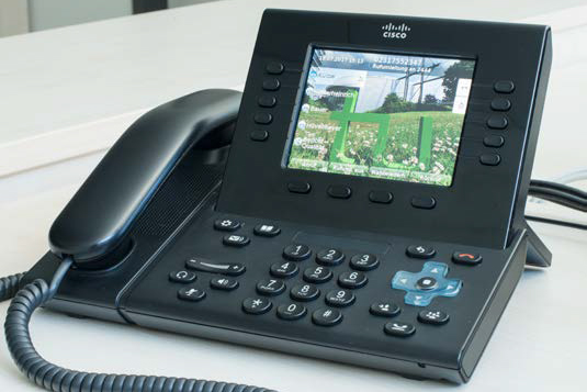 Telephone with display with TU logo