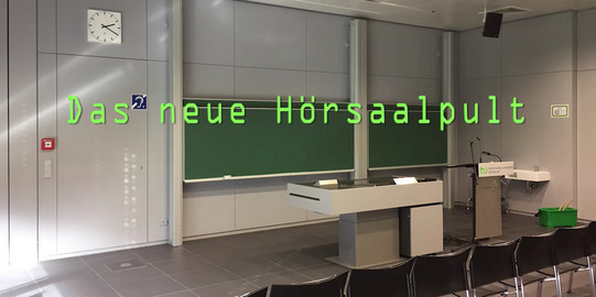 Startbild Hörsaalpult Startbild zum Film Hörsaal mit neuer Medienausstattung