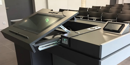 lecture hall desk with media equipment