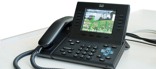 Telephone with display with TU logo