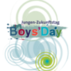 Schriftmarke des Boys' Day mit der Überschrift Jungen-Zukunftstag vor mehreren Bunten Kreisen.