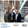 Group photo of the project "eLLa4.0 - Sociodigital Transformation towards Excellent Leadership and Labour" at a staircase of the Social Research Centre.