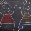 children drawn on a blackboard