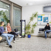 Students sitting in the waiting area of the Central Student Advisory Service